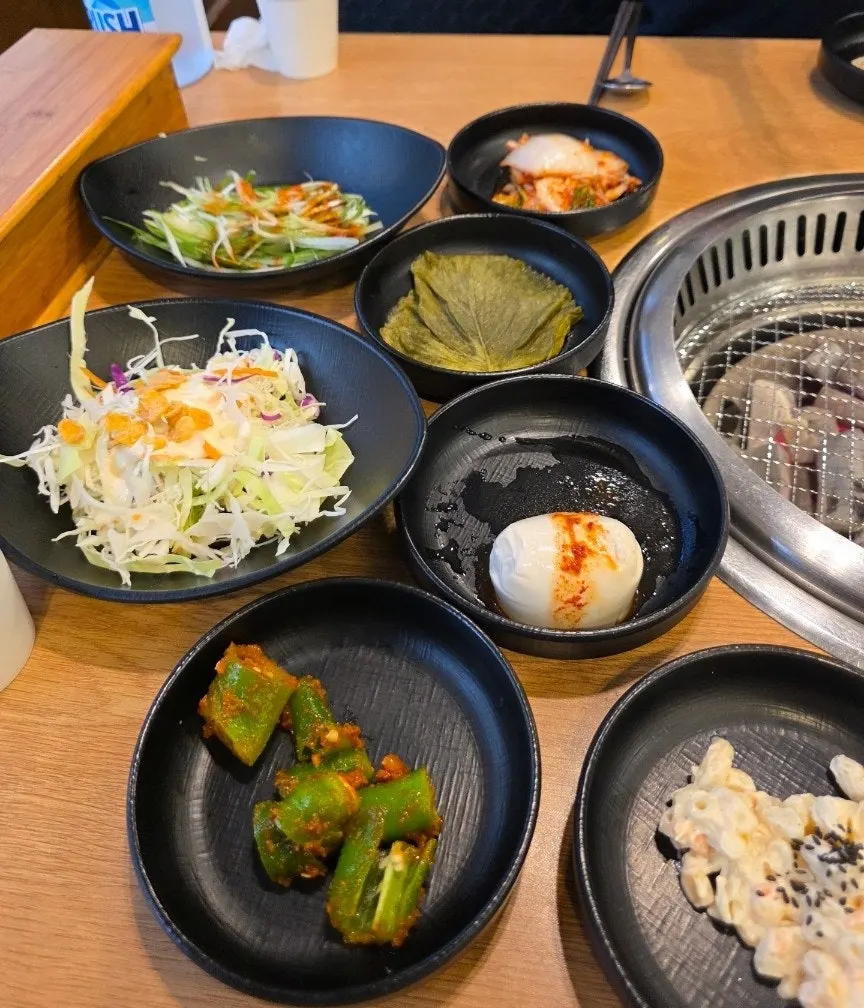 Full table of basic side dishes at Jeongwon Galbi