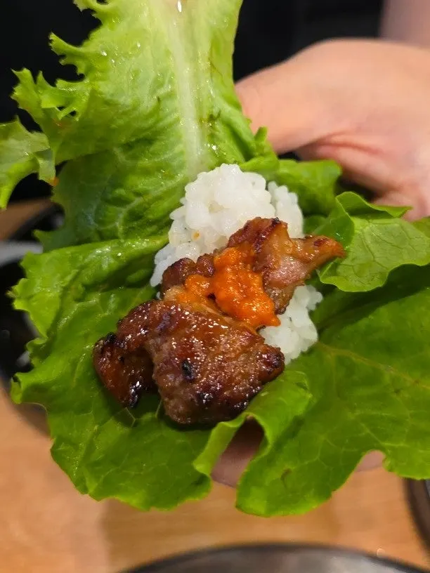 Lettuce wrap with pork galbi and side dishes