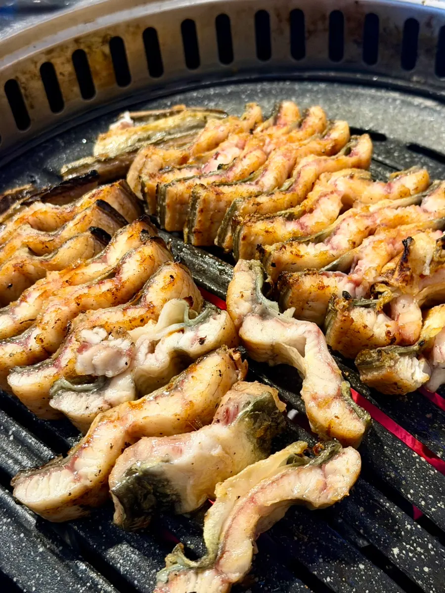 Table with leftover eel and side dishes