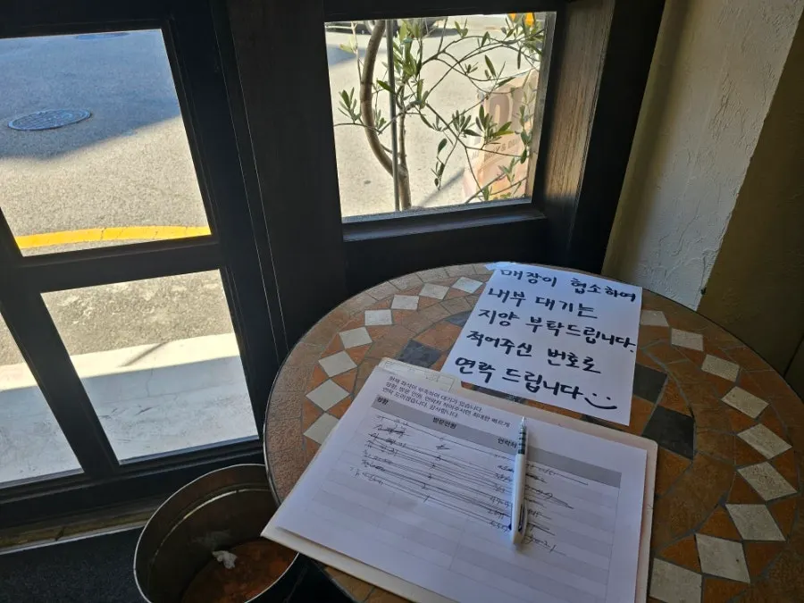 Interior of Deli Donkatsu with large windows
