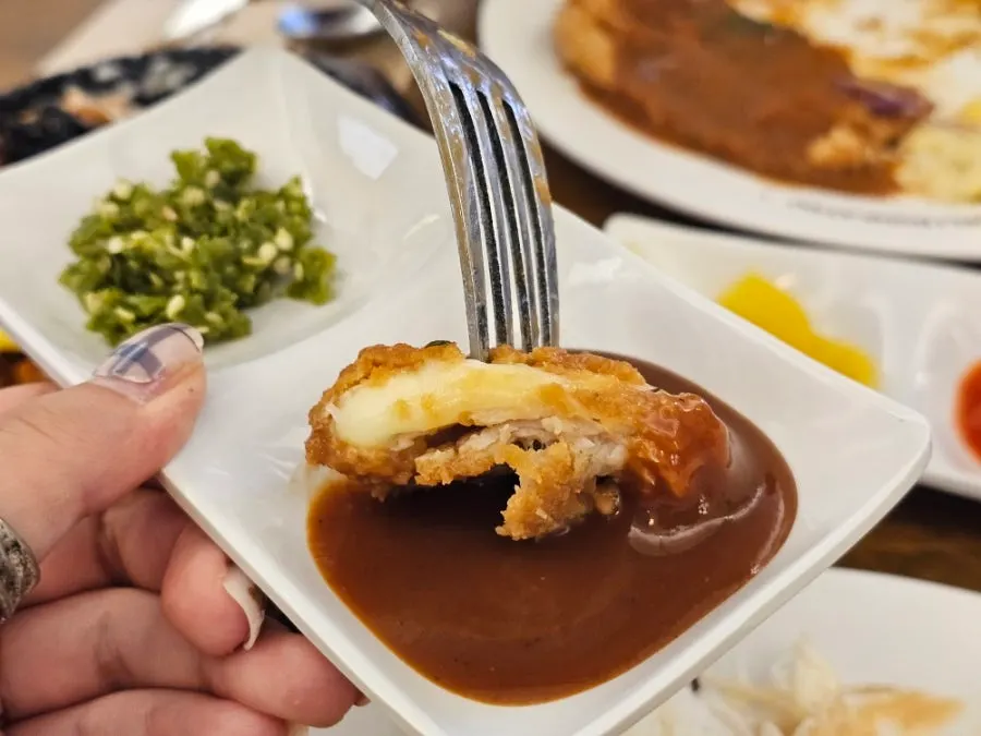 Spicy sauce served with pork cutlet