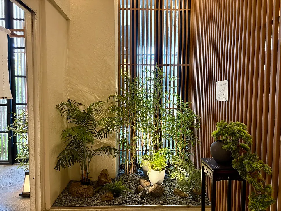 Interior of Hana Donkatsu with wood and white tones