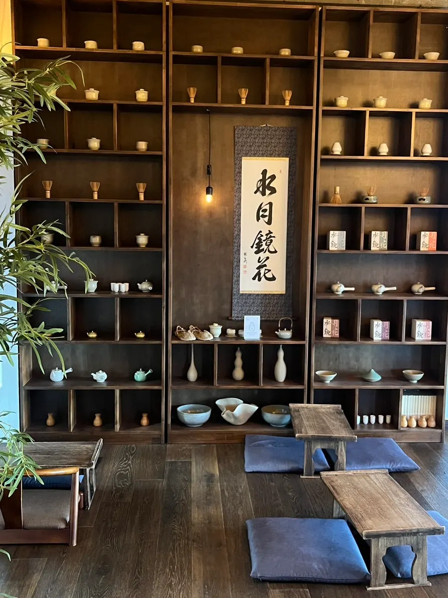 3rd-floor floor-seating space with a round window at Suwolgyeonghwa