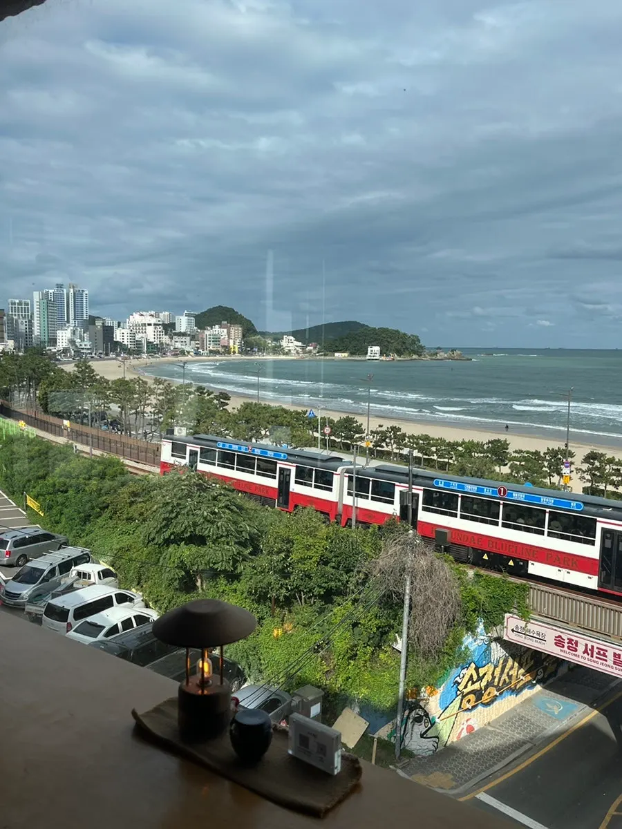Beach train and ocean view seen from Suwolgyeonghwa's 4th floor