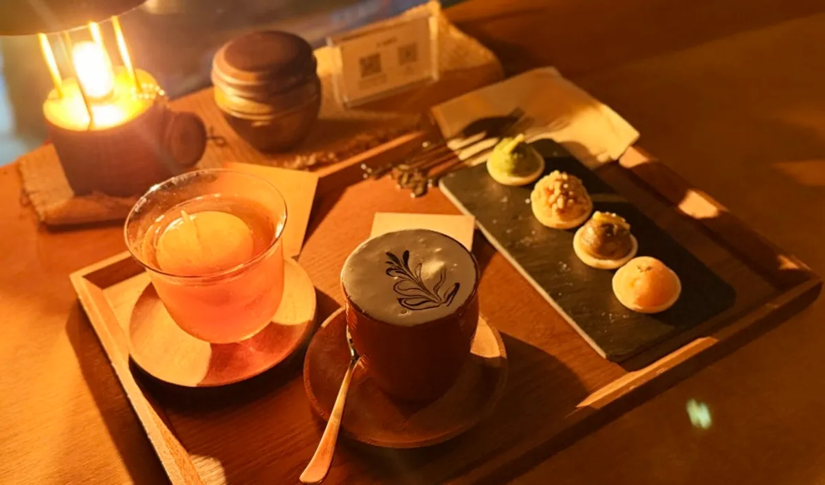 A spread of Bammaseul To and Wol tea cocktails with Pungwol dessert