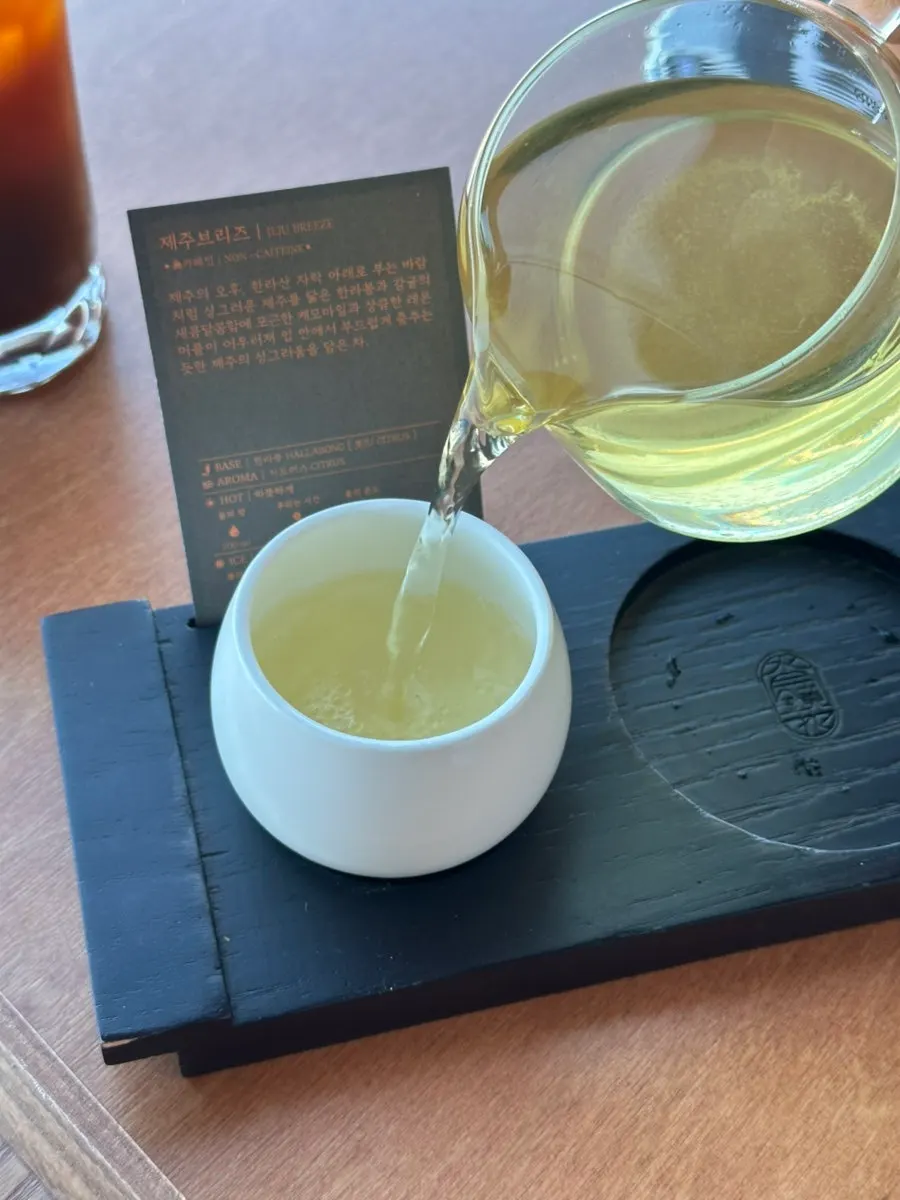 Jeju Breeze tea set at a window seat
