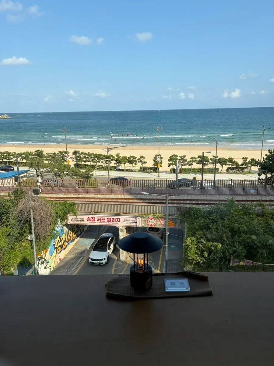 Songjeong sea seen through the window on a clear day