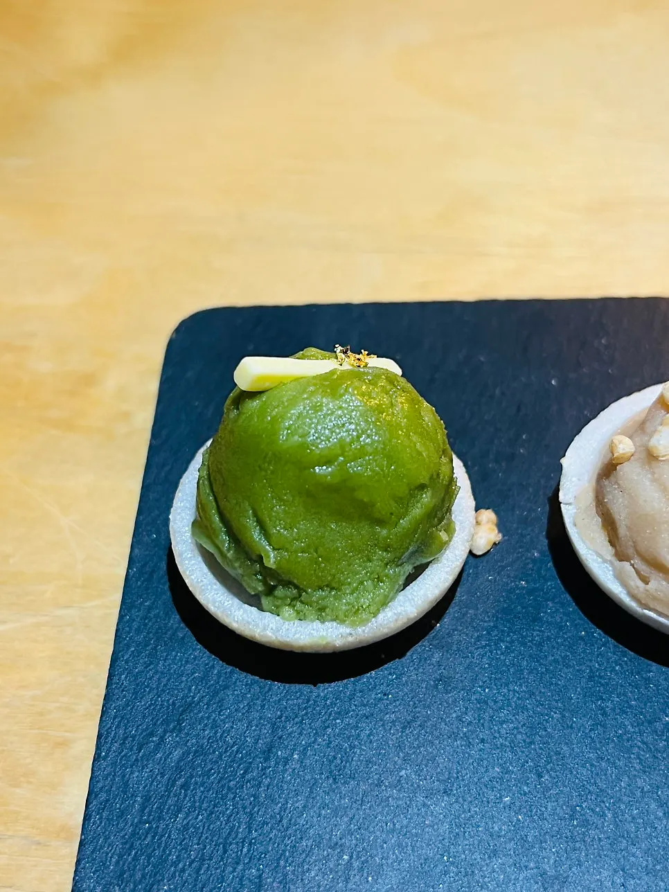 Close-up of monaka topped with bean paste