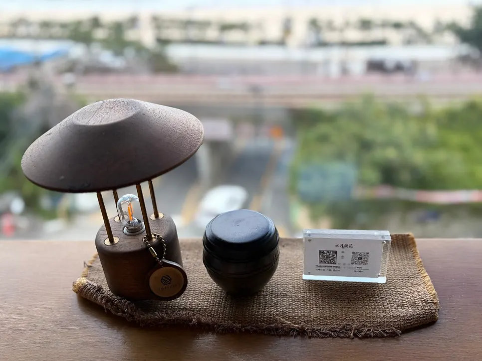 A teacup set against the backdrop of Songjeong's sea