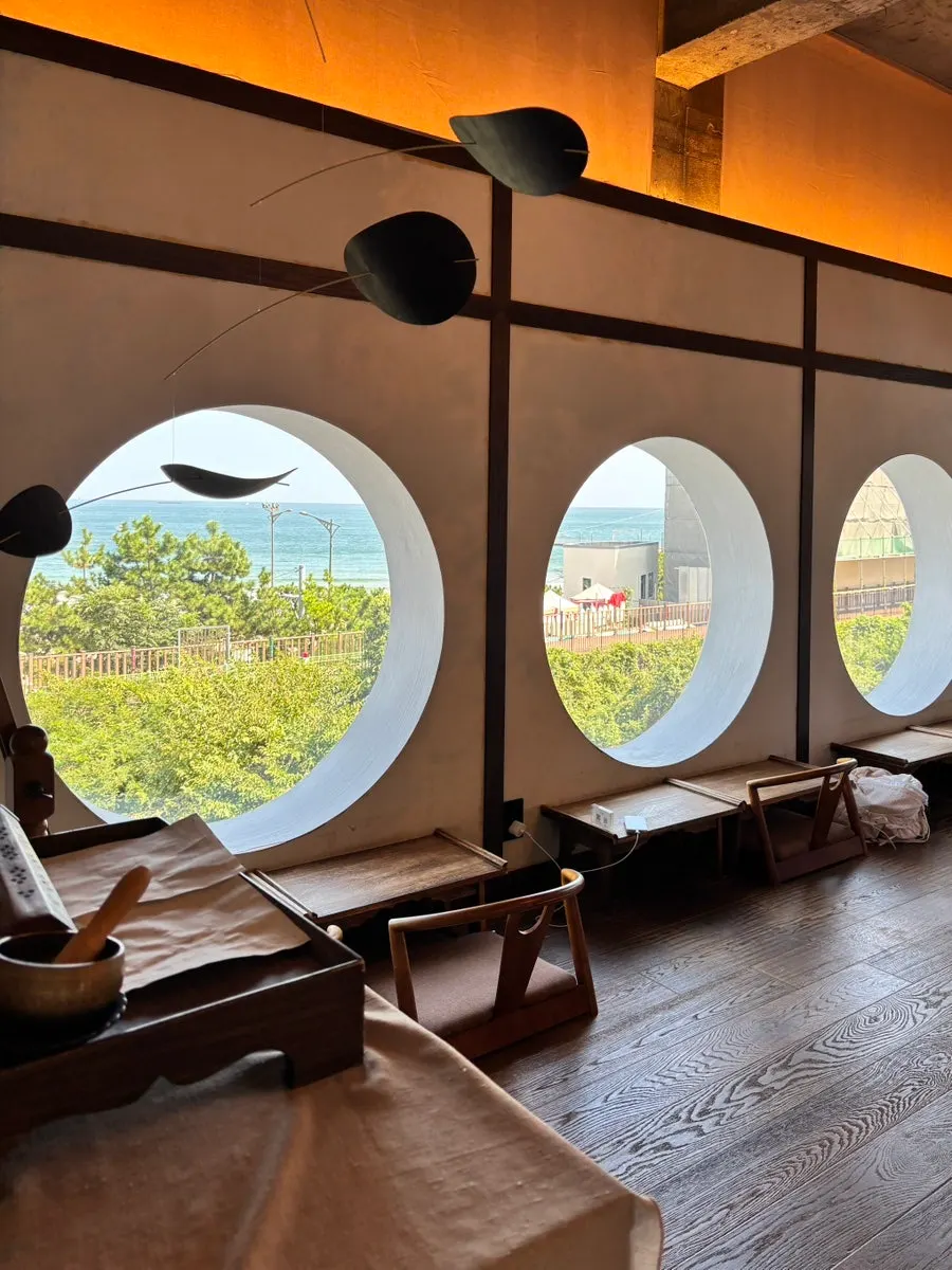 Floor-seating area surrounded by windows
