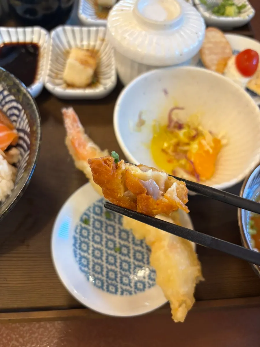 Shrimp tempura served with the salmon rice bowl