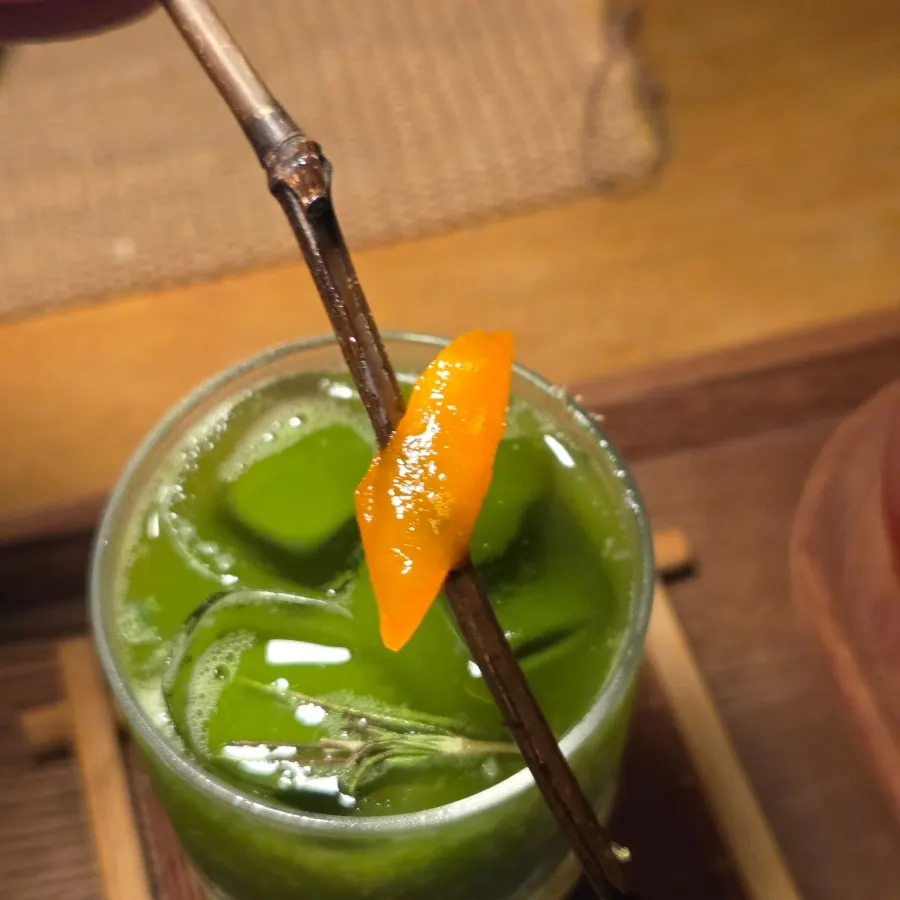 Geum drink with the night sea in the background