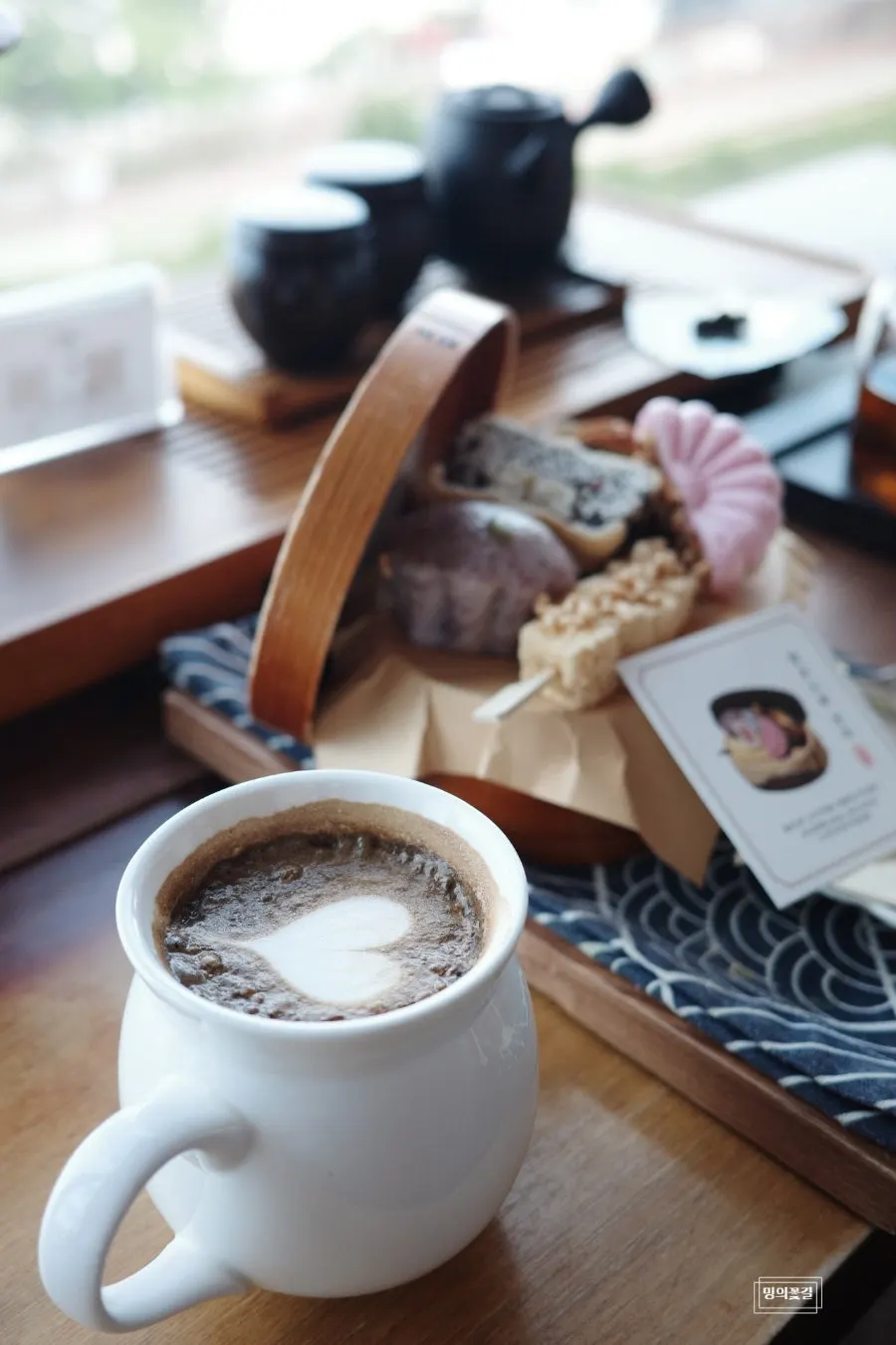 Hojicha gabae topped with latte cream