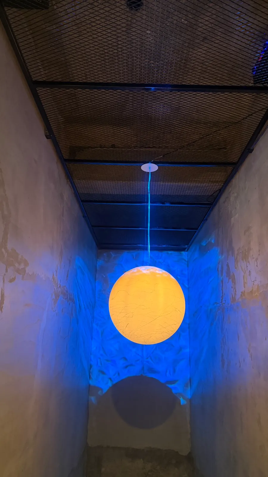 Stairway with a round moon light and blue lighting