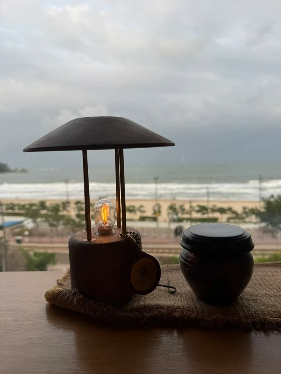 Teas available to buy and a view of Songjeong Beach