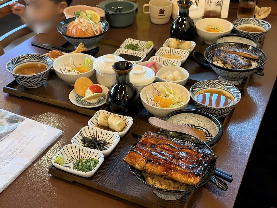 Three of Yuok's set meals laid out on the table