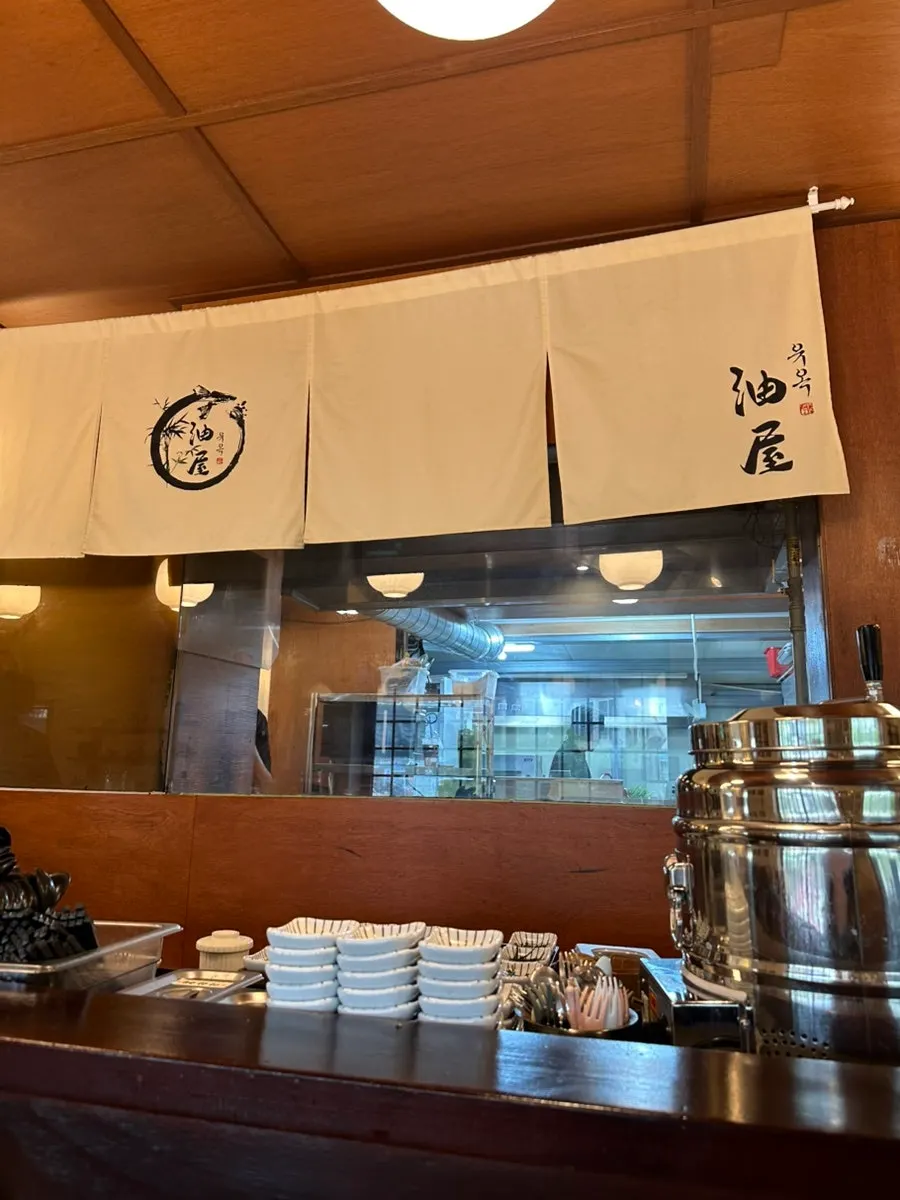 Yuok's entrance decorated with wood and tile