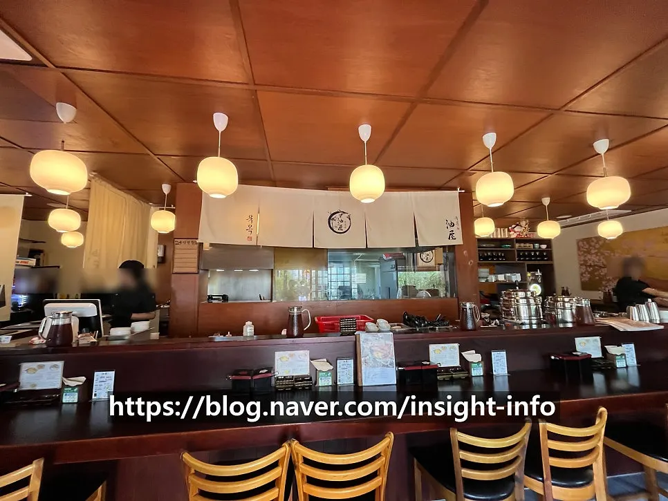 Interior of Yuok decorated in warm wood tones