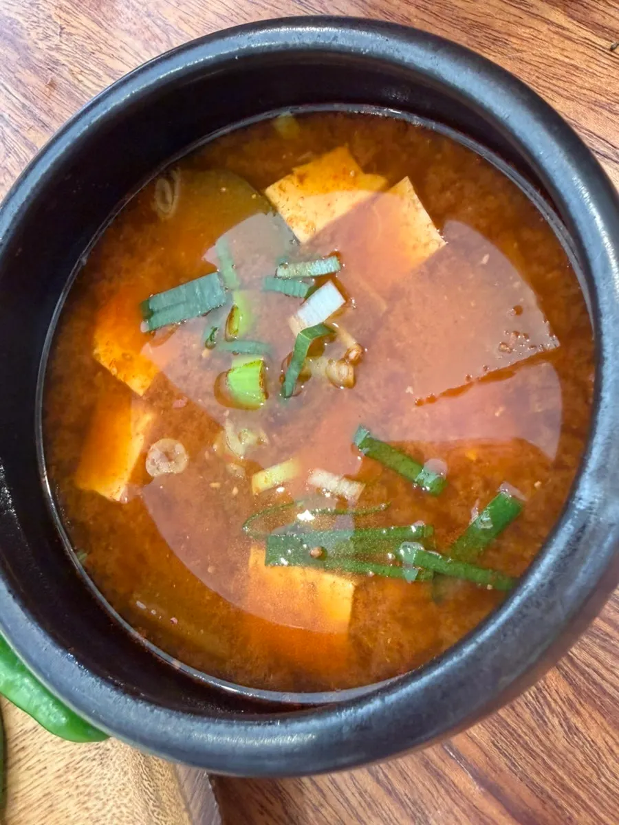 Doenjang jjigae and basic table setting served together
