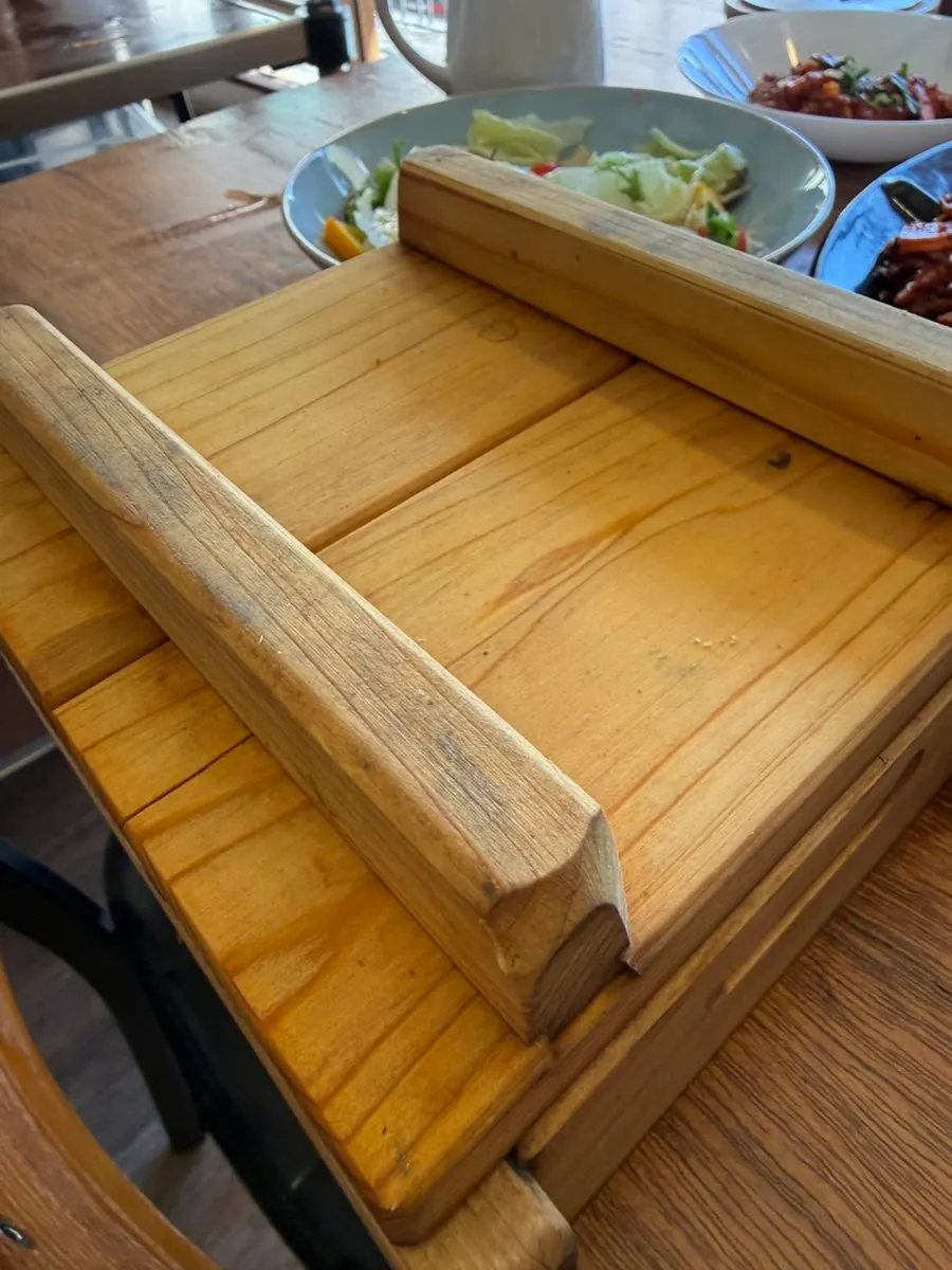 Individual pot of seafood hinoki steam served one per person