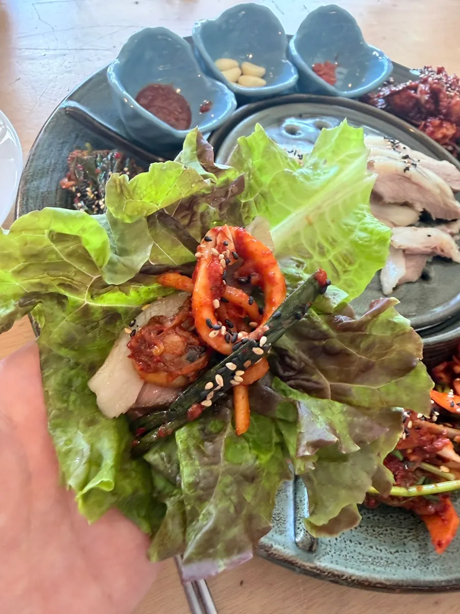 Lettuce wrap with boiled pork and seasoned side dish