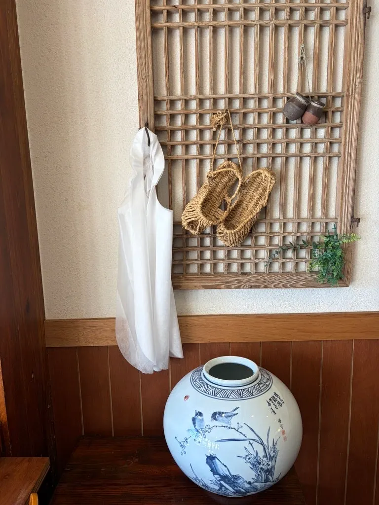 Interior space leading up to the second floor at Songjeongok