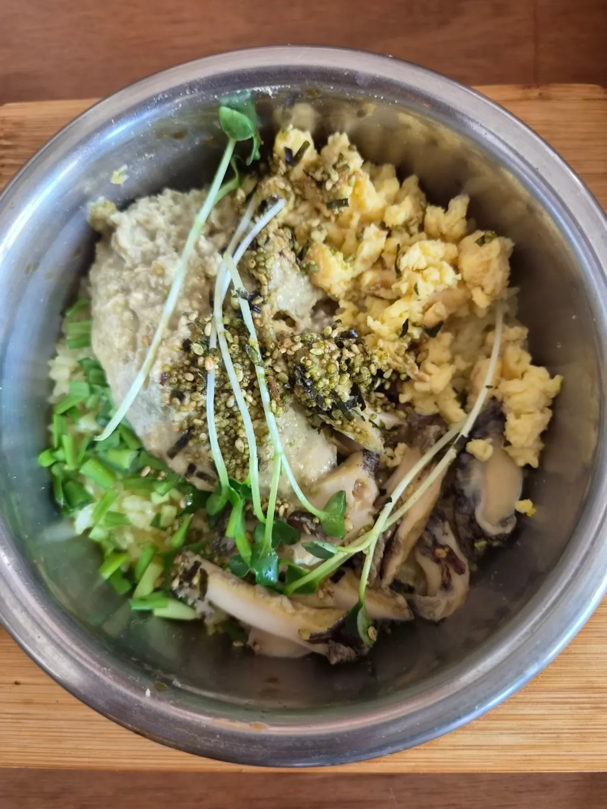 Songjeongok's abalone pot rice topped with abalone