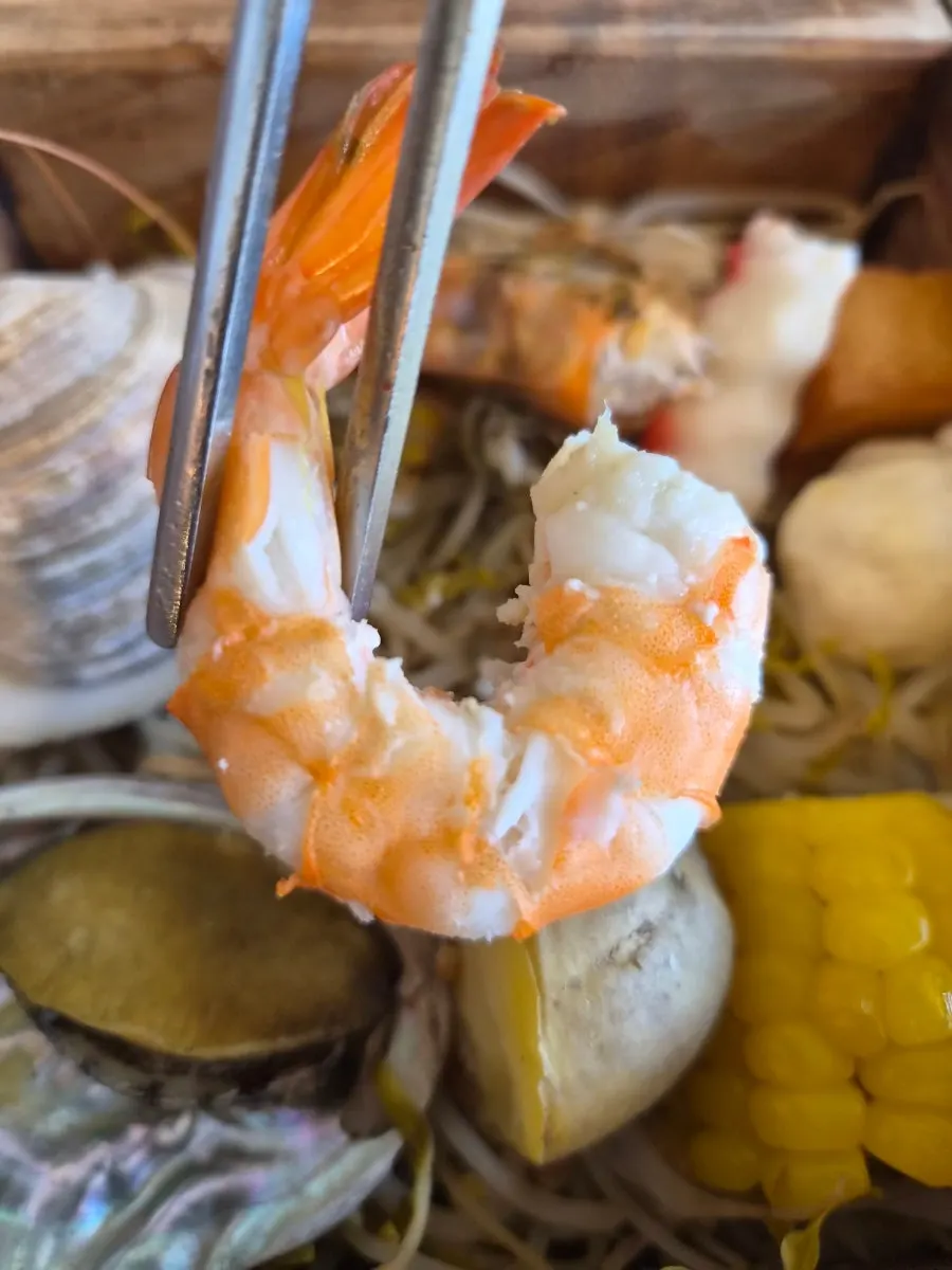 Close-up of the steamed seafood in the hinoki steam