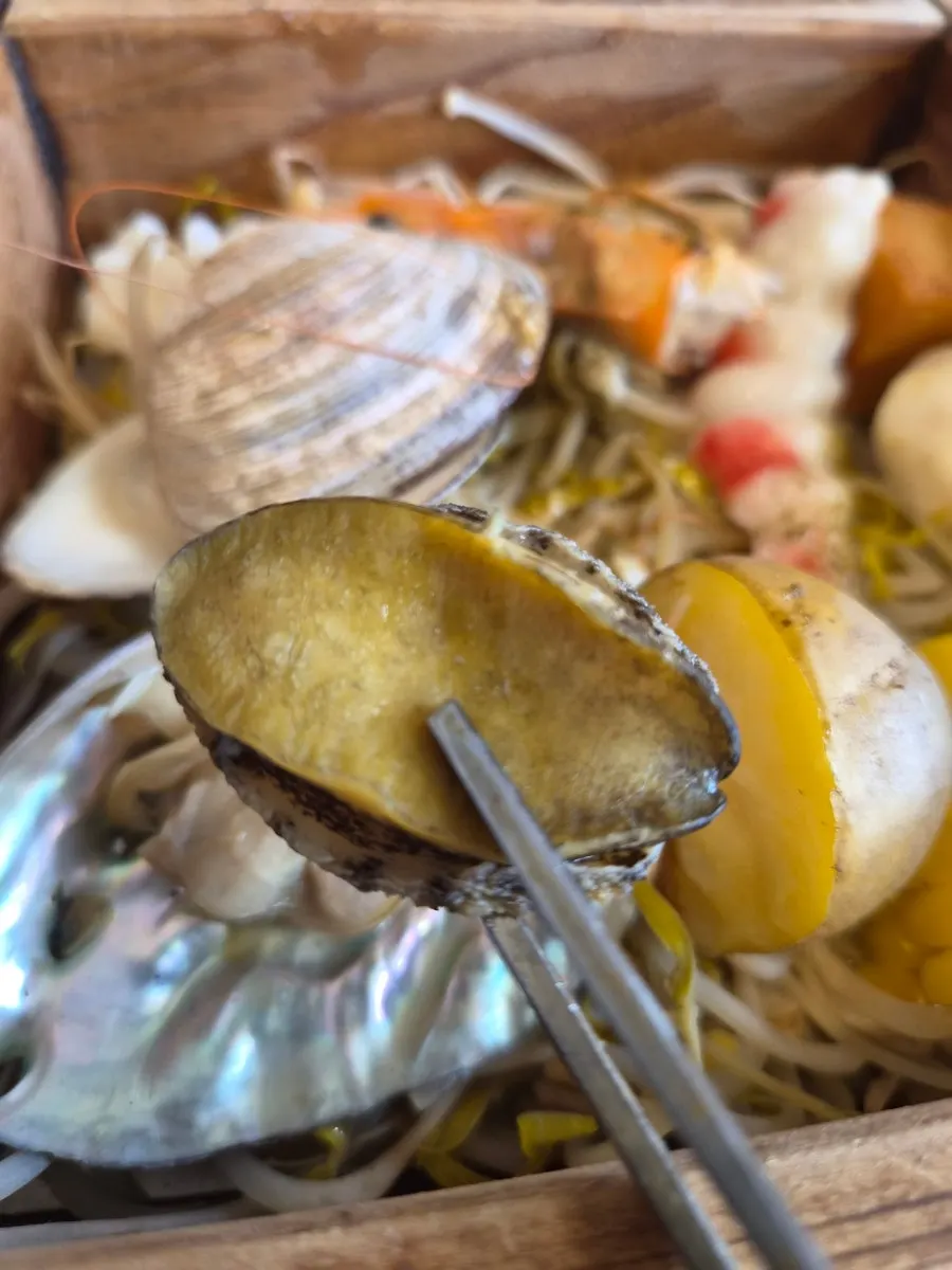 Seafood pieces with different textures from the hinoki steam