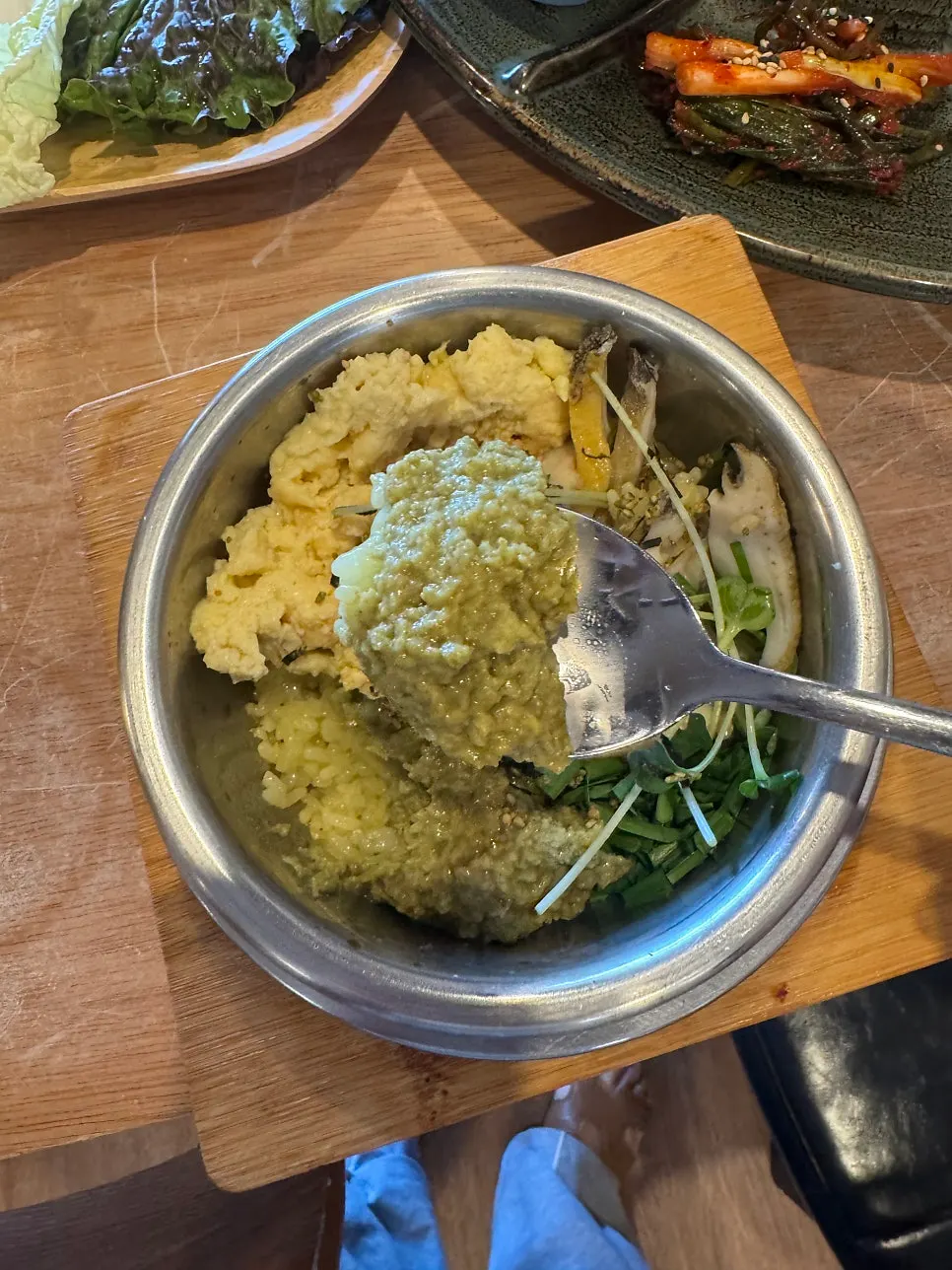 Table for two with pot rice and side dishes
