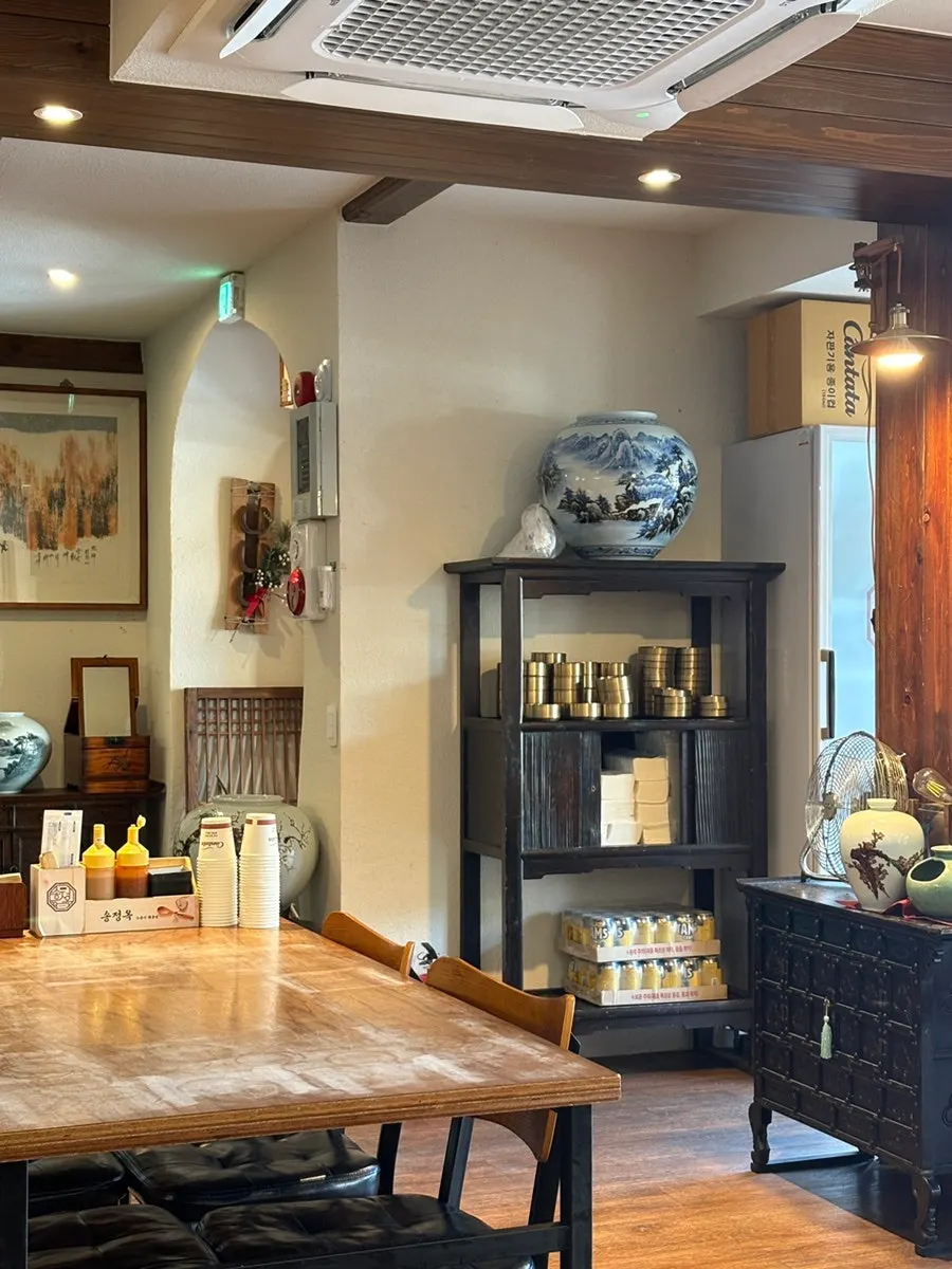 Interior space leading up to the second floor at Songjeongok