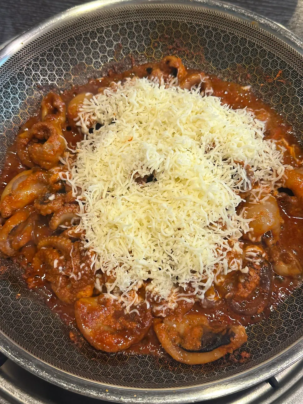 Snow cheese piled generously on top of the spicy octopus