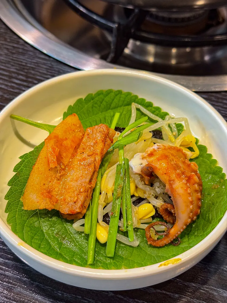 Octopus wrapped in perilla leaf and seaweed