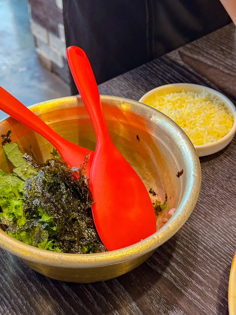 A bowl of rice mixed with the octopus sauce