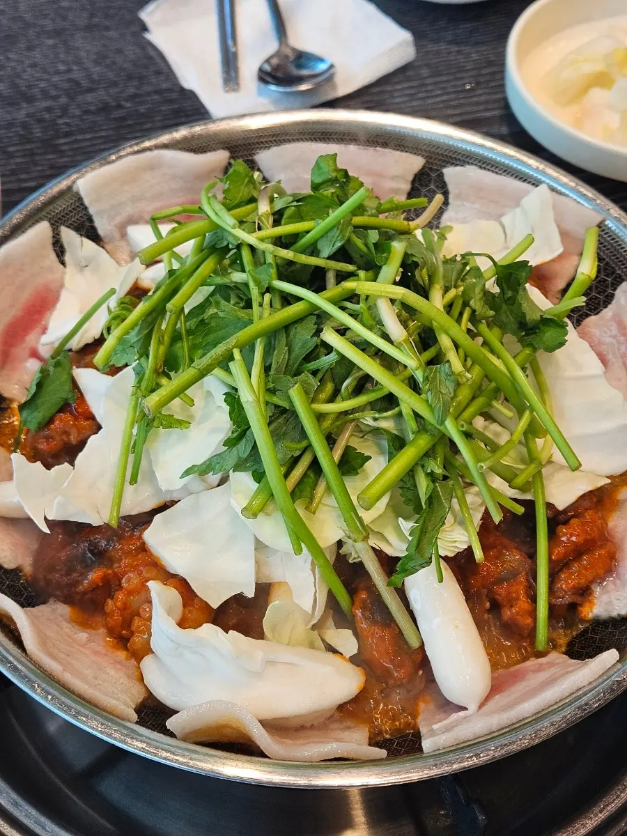 A pan of snow cheese octopus sari-mongttang served as a two-person portion