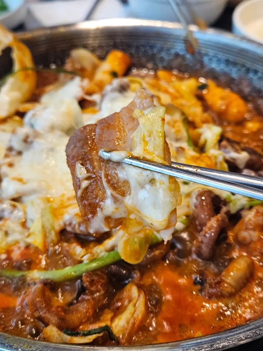 A combination of pork belly and cheese rice cake with the octopus