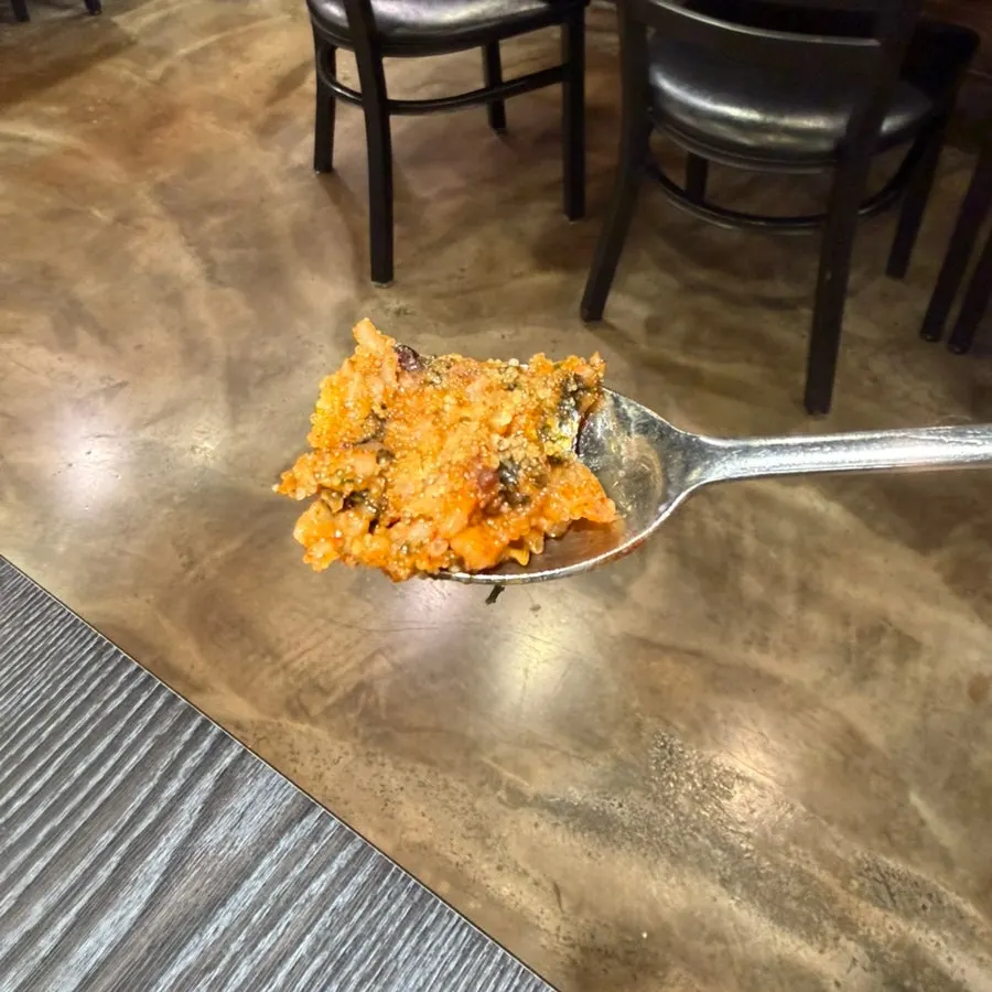 Finished flying fish roe fried rice topped evenly with roe