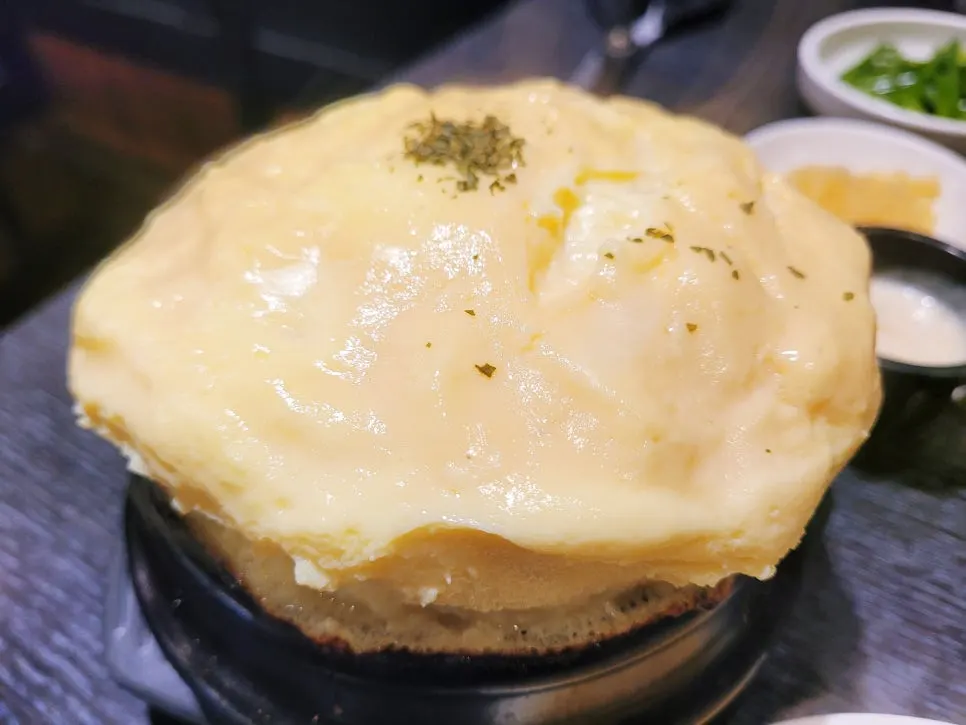 Cheese steamed egg ordered alongside the meal