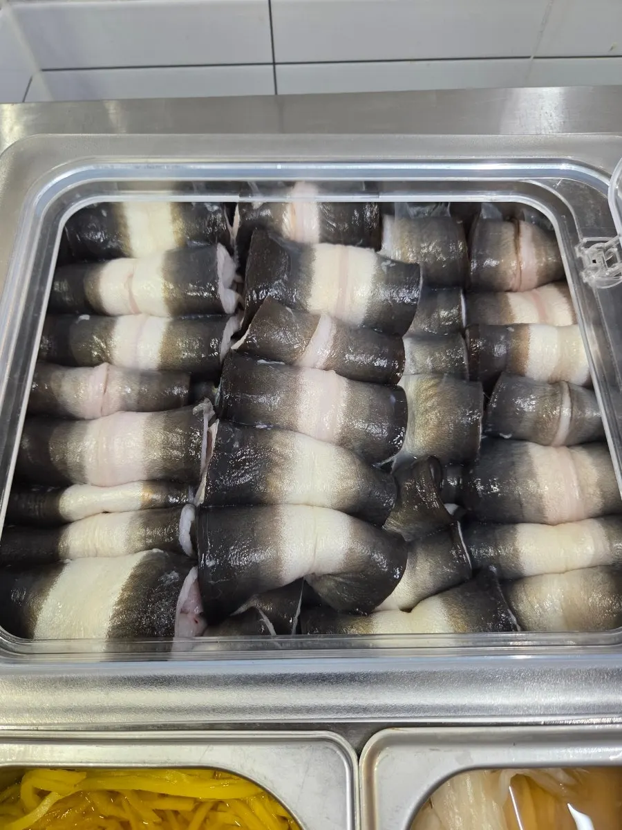 Eel and meat grilling together