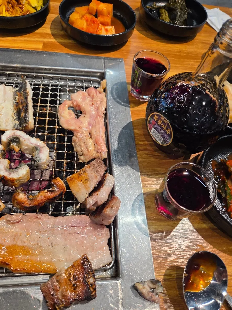 Grill full of eel and meat