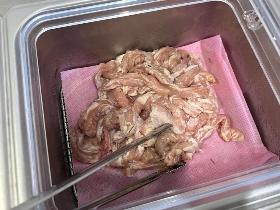 Herb-topped pork belly on the self-serve bar