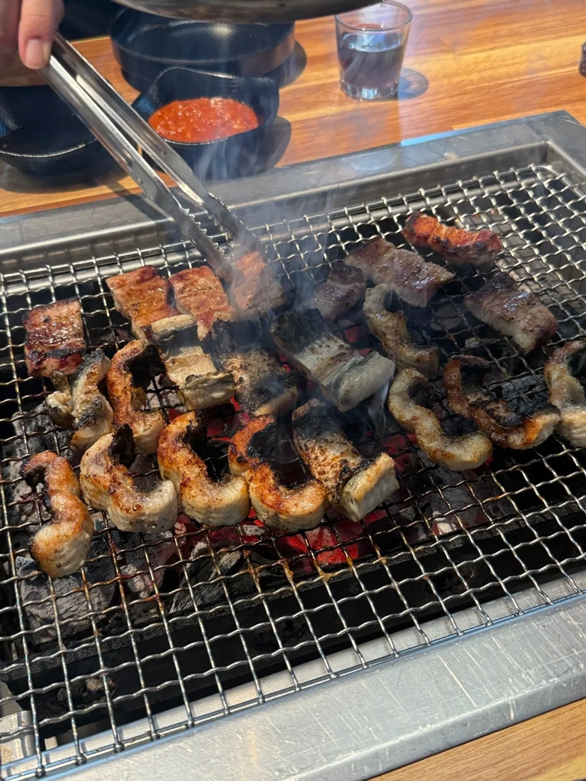 Pork belly and eel grilled crispy over charcoal
