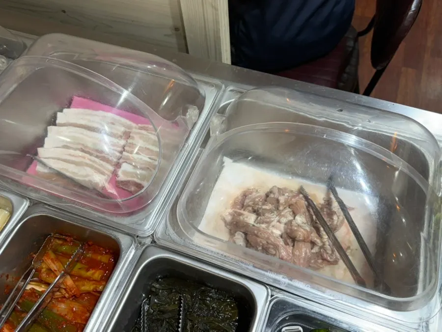 Side dishes and ingredients ready at the self-serve bar
