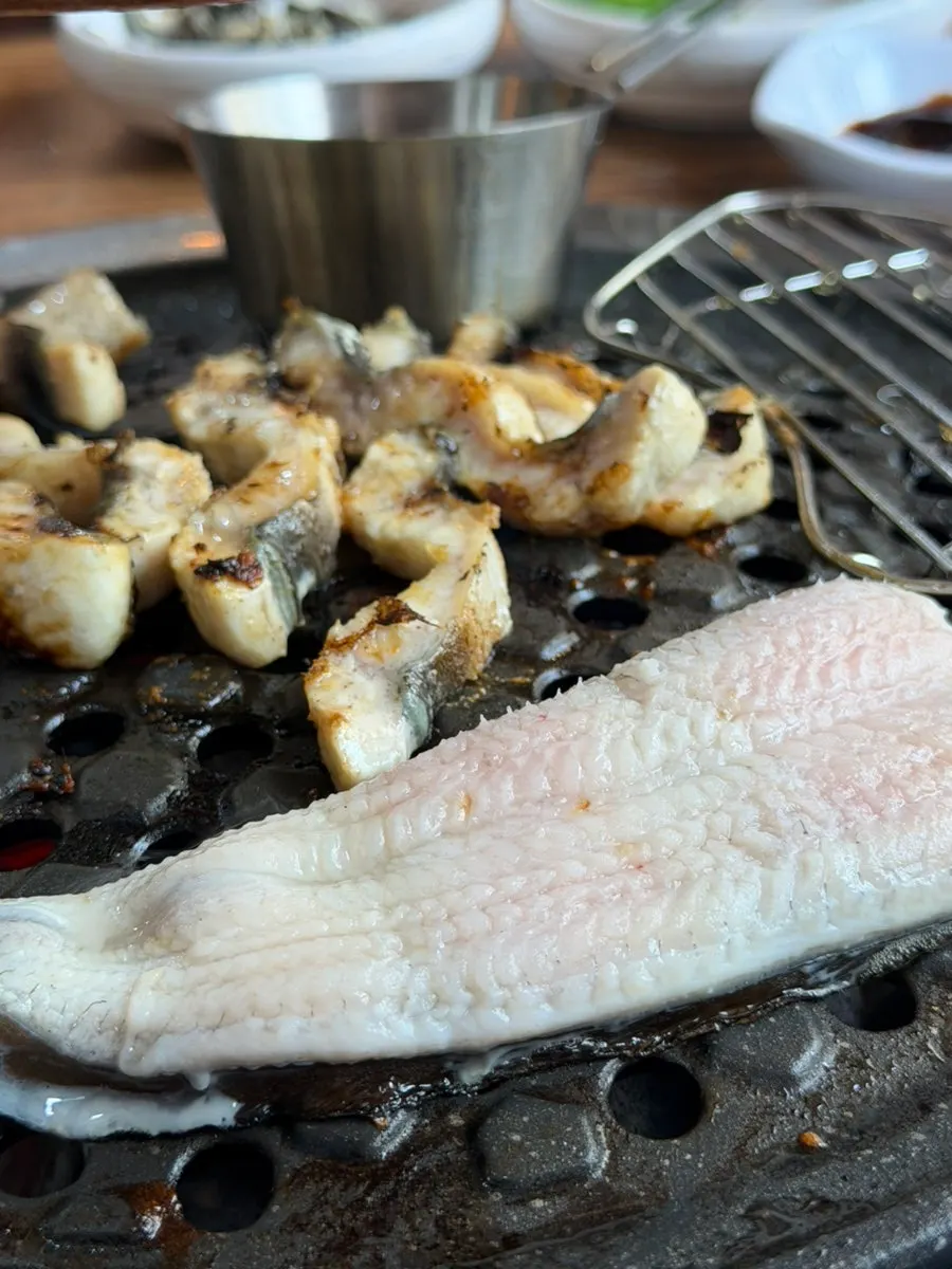 Eel served with pickled perilla leaves and shredded ginger