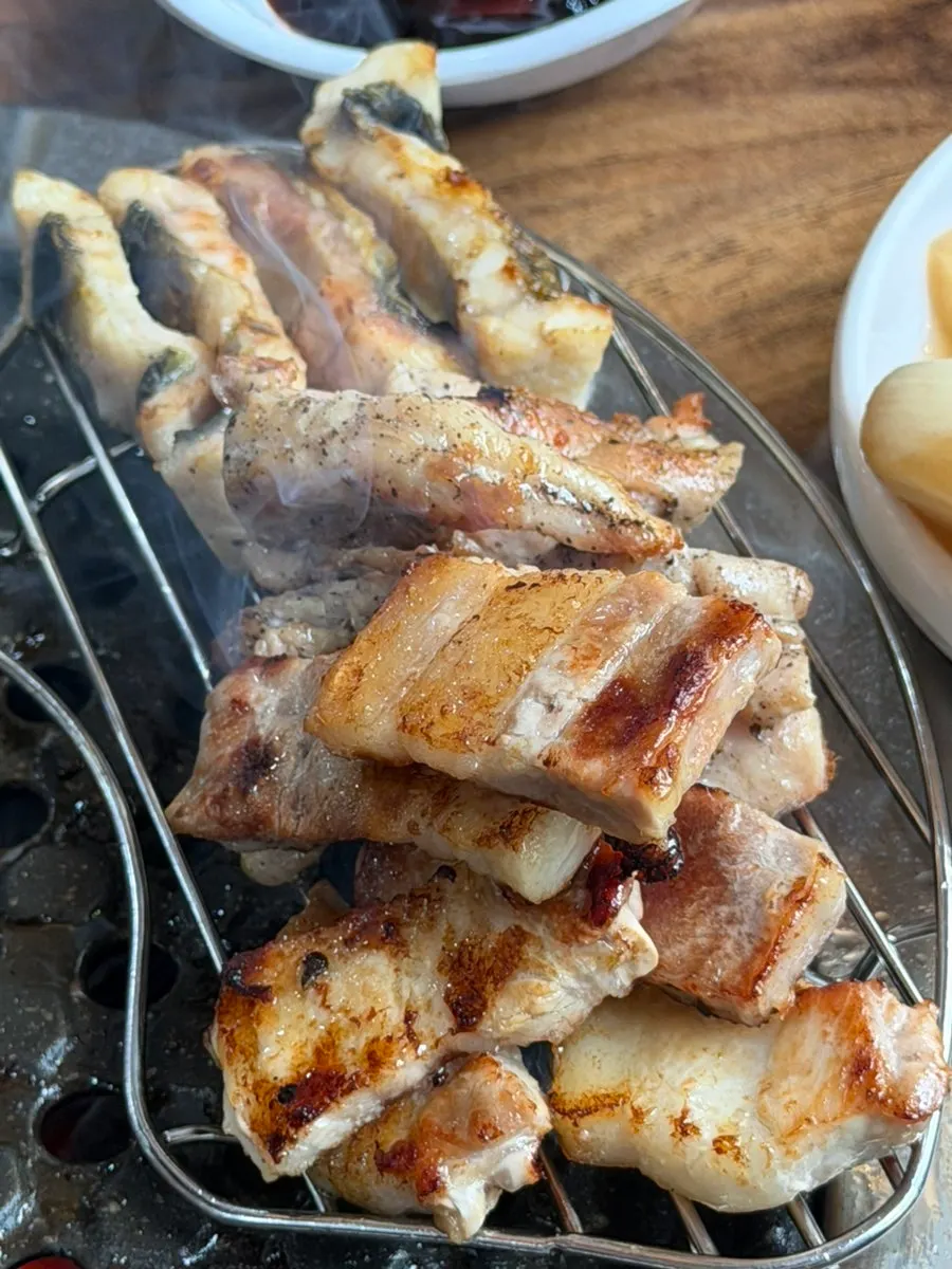 Pork belly wrapped in white kimchi