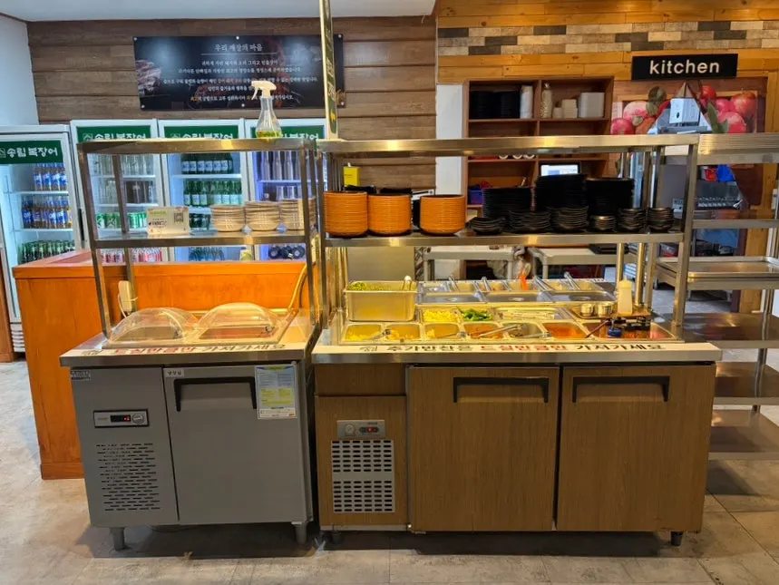 Self-bar with side dishes and vegetables neatly arranged