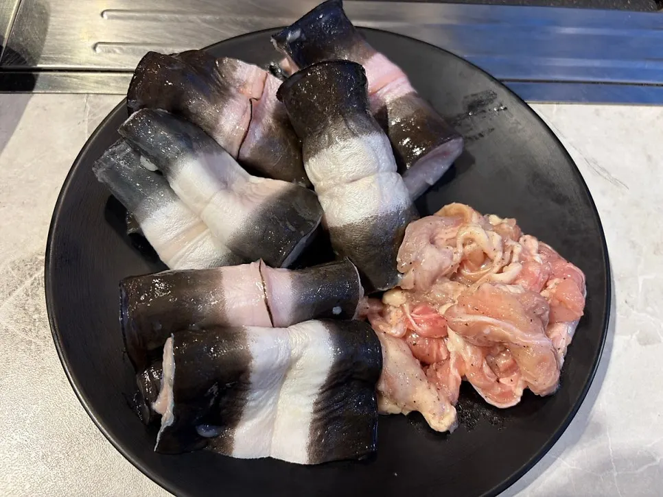 Thick freshwater eel pieces on a plate