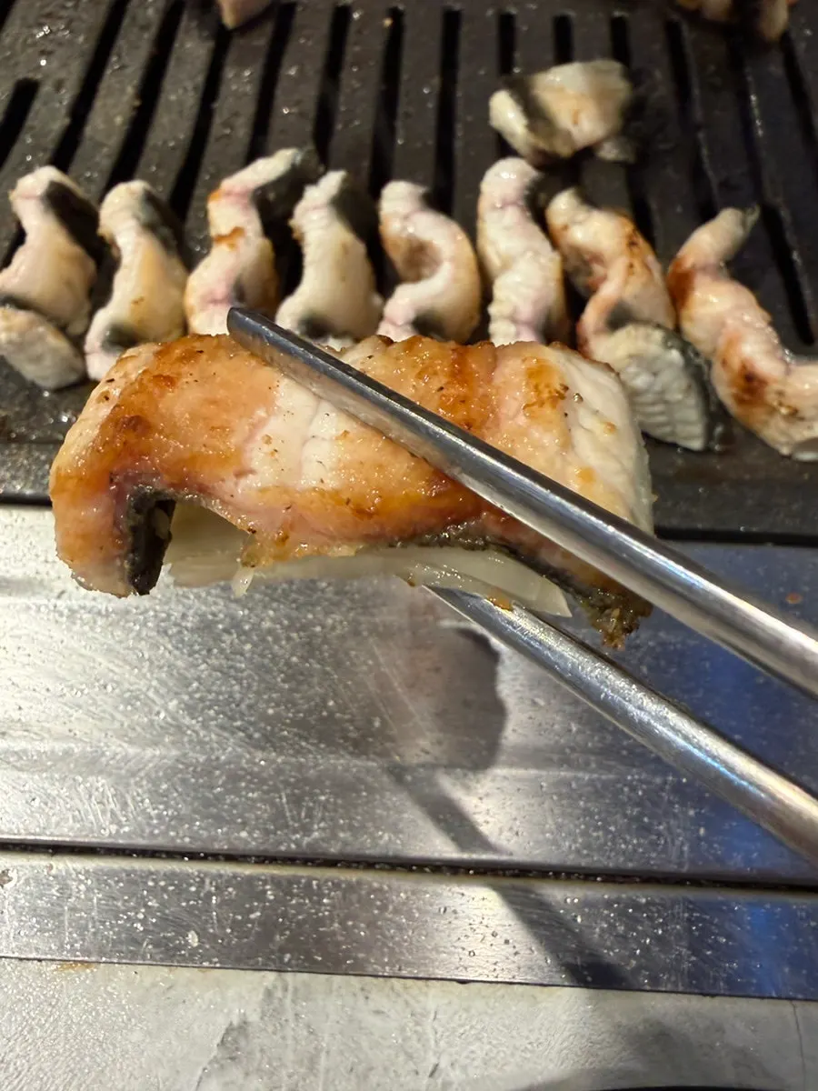 Eel grilled skin-side down