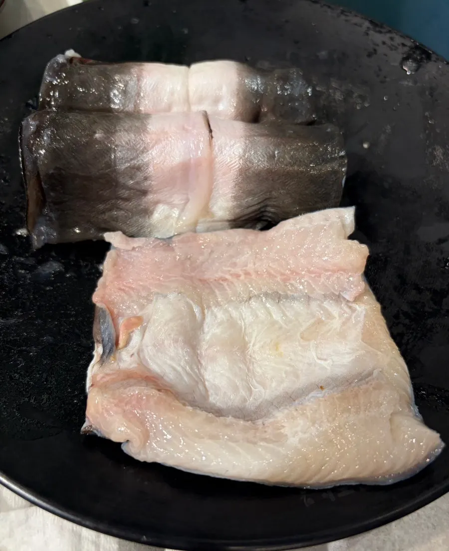 Eel and chicken neck meat grilled together on the plate