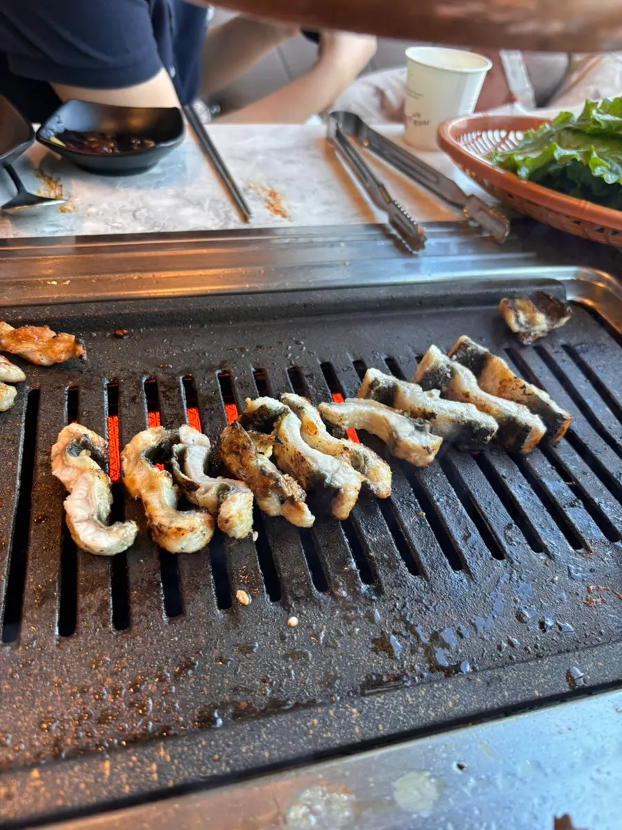 Grill with the second plate of refill eel cooking